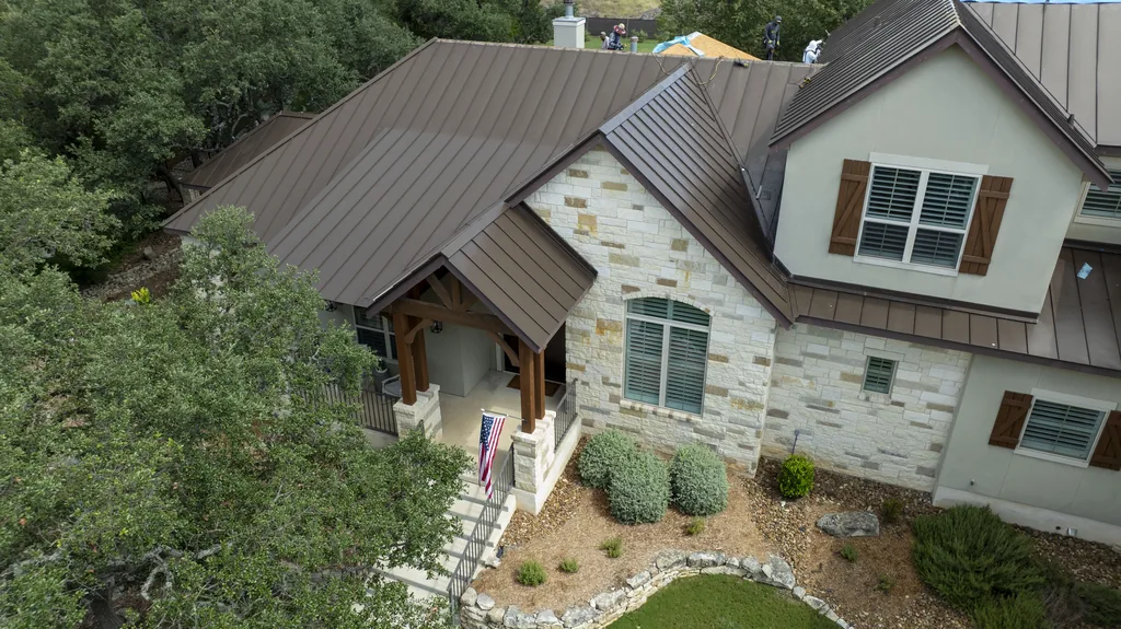 Aerial view of a new standing seam metal roof in Fair Oaks Ranch, TX 78015