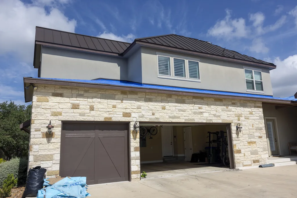 Completed metal roof replacement on a Fair Oaks Ranch, TX Hill Country home