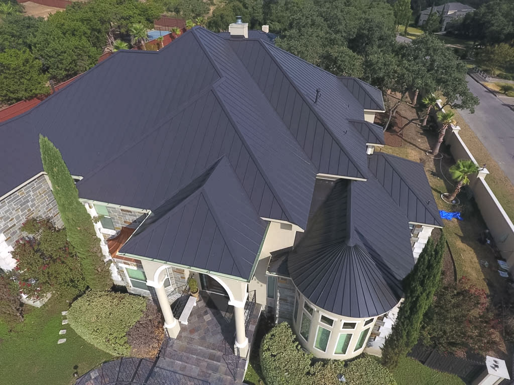 Overhead image of a residential metal roof that has been replaced