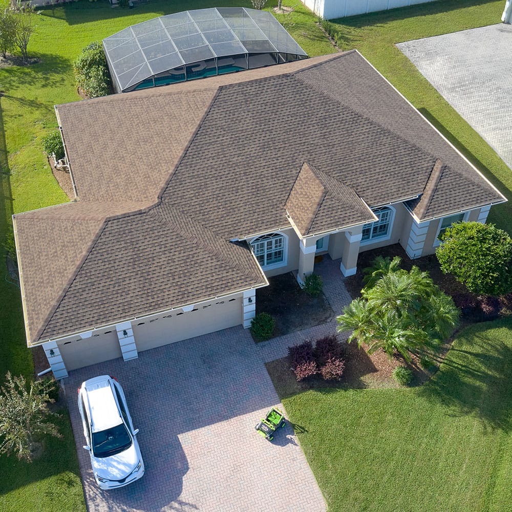 Aerial image of a residential roof with GAF Timberline HDZ roofing shingles